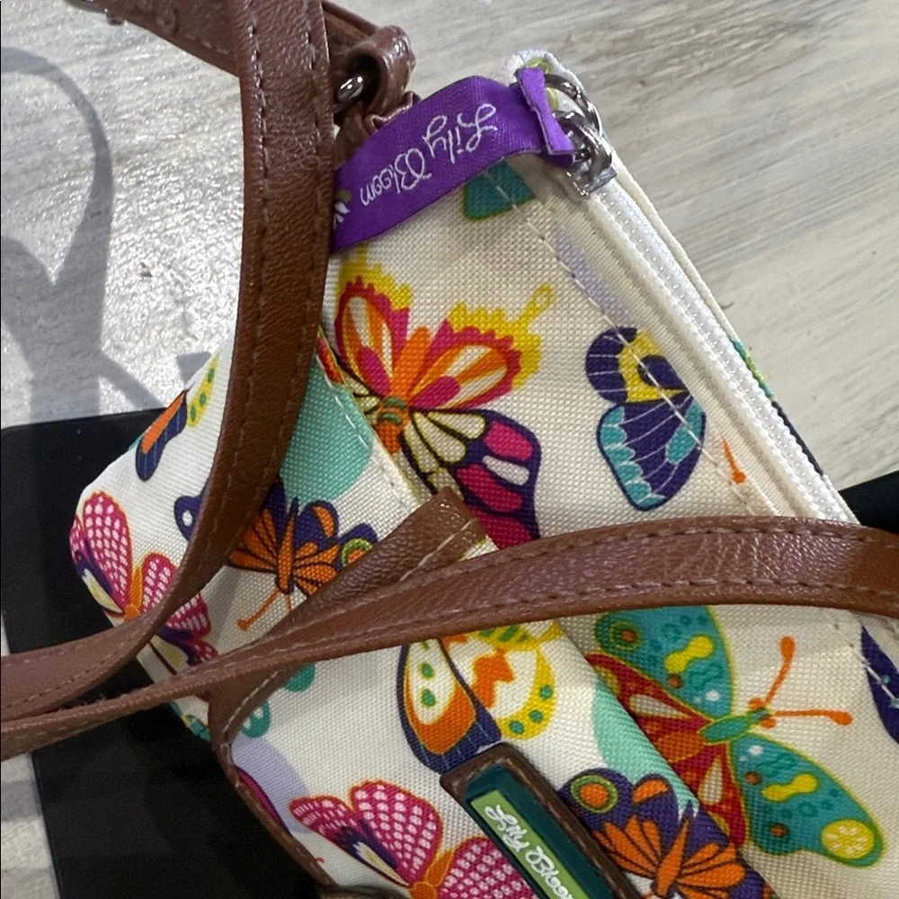 Lily Bloom Cream Crossbody Bag with Multicolor Butterfly Print and Brown Trim - Picture 5 of 12